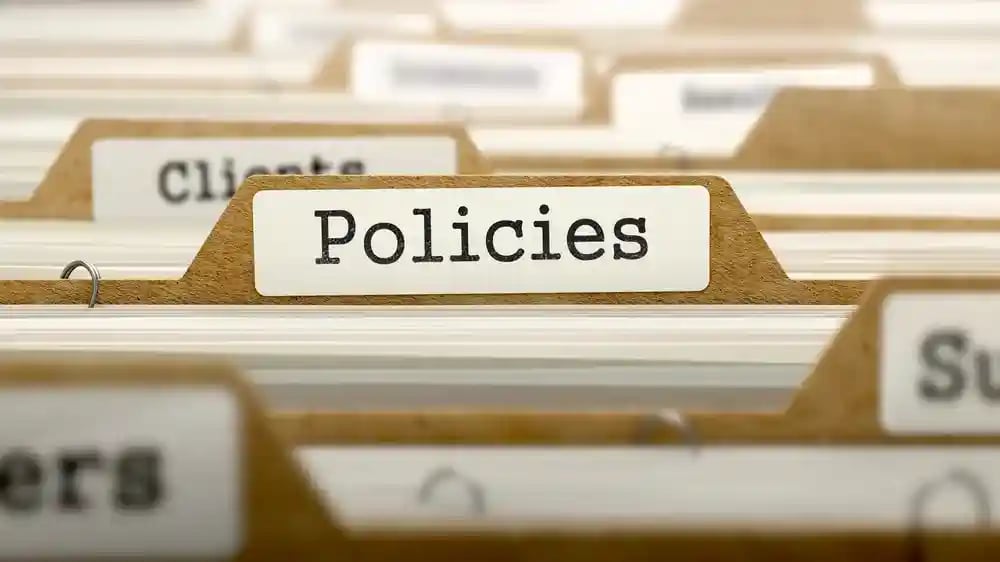 Policies Concept. Word on Folder Register of Card Index. Selective Focus._11zon
