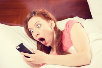 woman seeing overdraft fees from bank because her financial service doesn't use Mogli: SMS & WhatsApp for Salesforce to send her reminders and alerts
