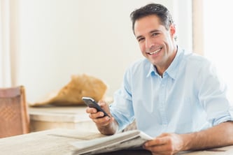 man texting with customer support via Mogli: SMS & WhatsApp for Salesforce chatbot