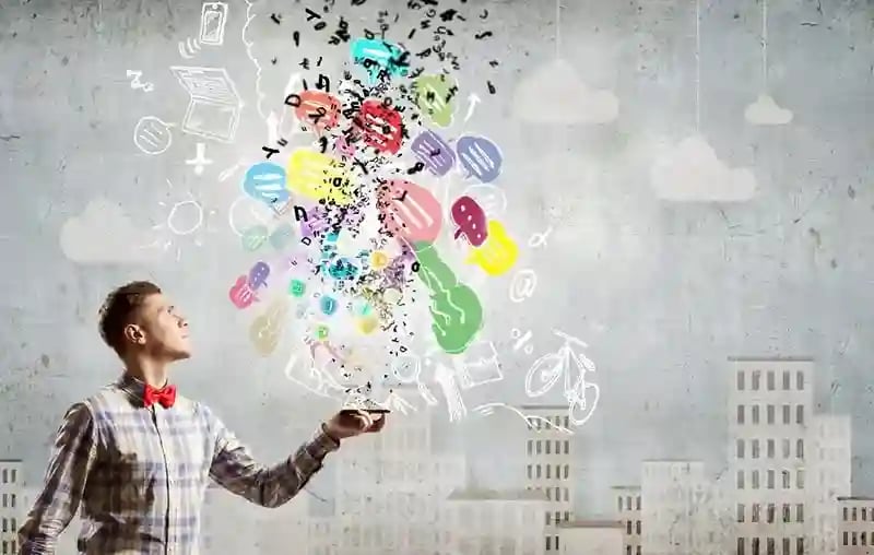 Young man with mobile phone and colorful chat icons_11zon