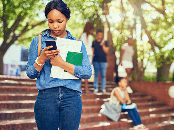 College student on her phone
