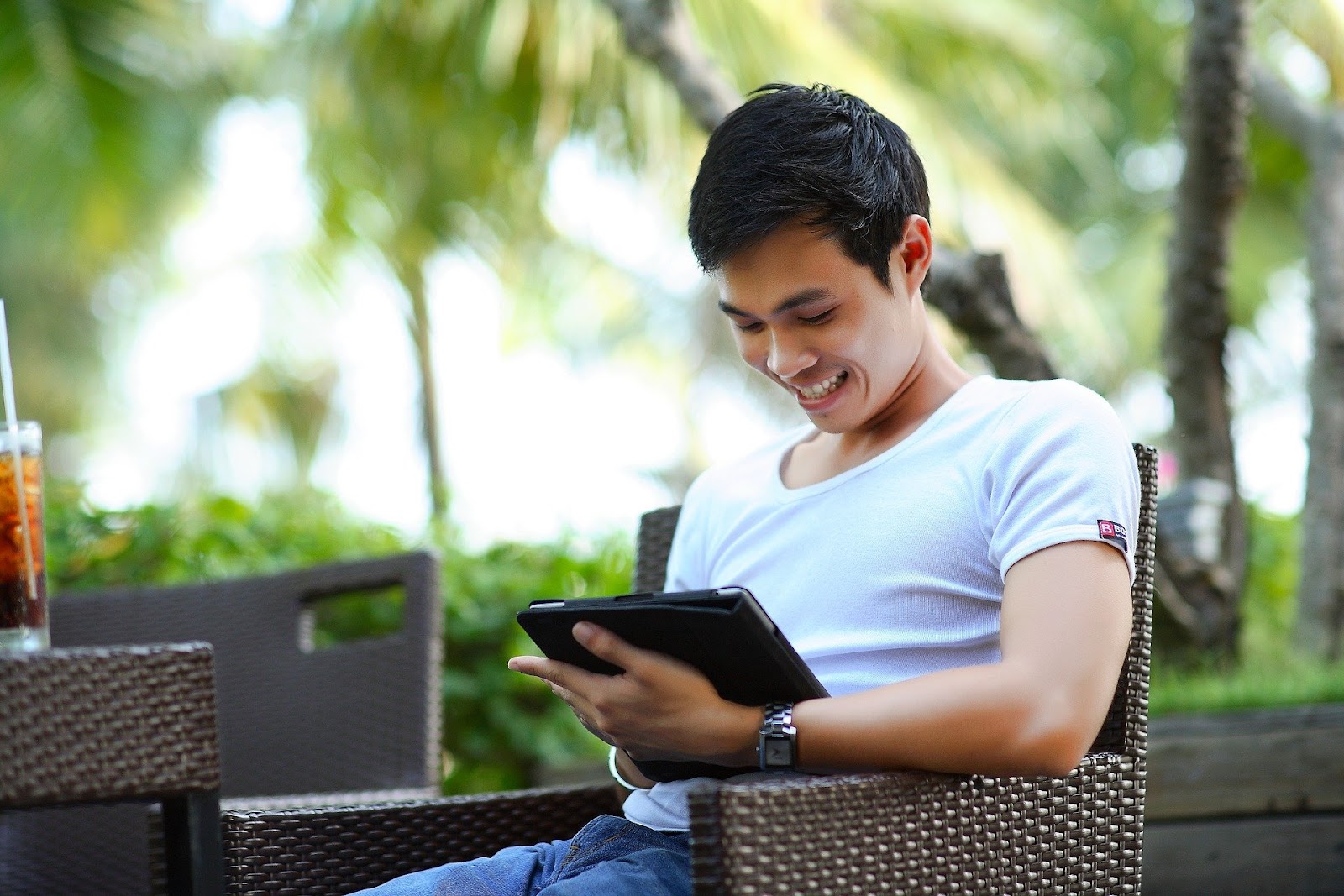 Man working on tablet device